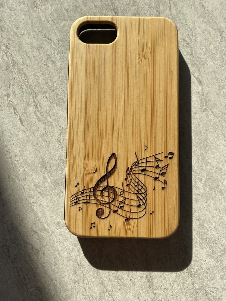 Étui de téléphone gravé, motif musical